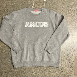 Fleece sweatshirt with appliqué